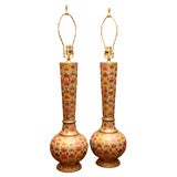 Pair of large Indian brass lamps.
