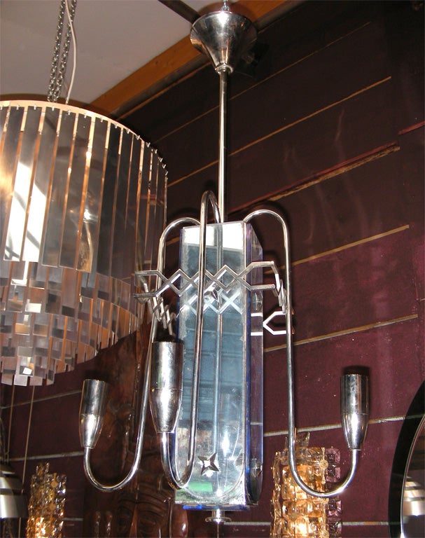 1940-1950 chandelier in silver metal with blue glass. Five branches.