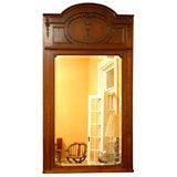 Antique English mahogany and amboyna wood inlaid mirror.