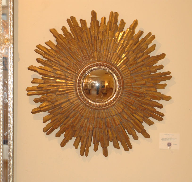 Beautiful heavily hand-carved, hand leafed composite sunburst mirror, inspired by an 18th century original star clock acquired in London. 

Finish options: Gold leaf, champagne leaf, silver leaf

Also available in 34