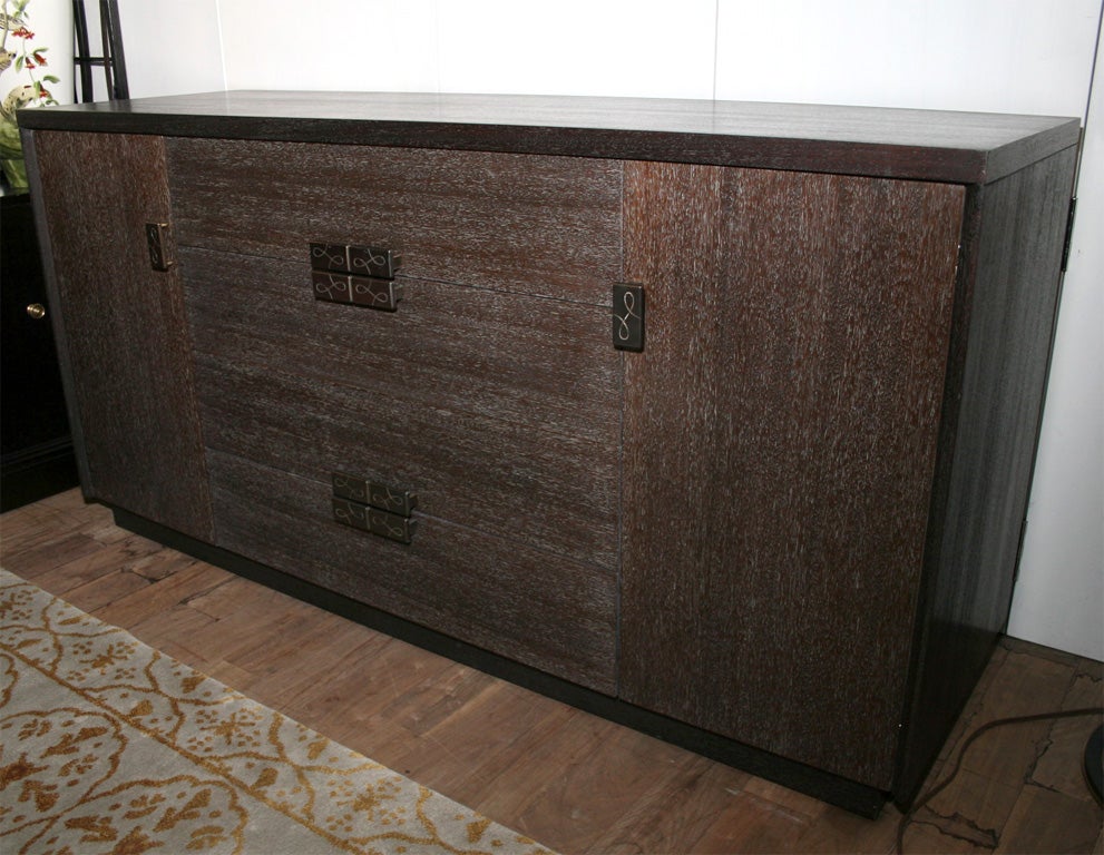 Cerused long dresser with sable finished case by the Cessna Co. circa 1947.  Drawer interiors are entirely metal. After the war, the Cessna Co. adapted their assembly for a limited time to make furniture.