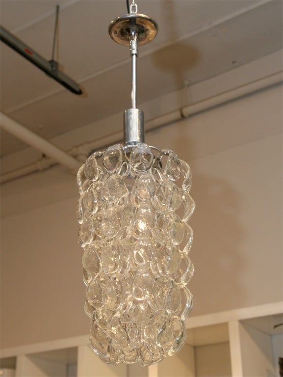 Beautiful compact glass chain link ceiling light. Perfect scale for a smaller space.