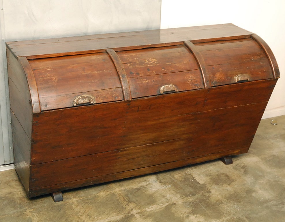 This grain, storage, (toy), bin is probably from a French farm and began life in an earlier year of the 1900's. Made in pine and other woods it sits on runner type feet and has three sliding covers over the divided storage areas. It looks the part
