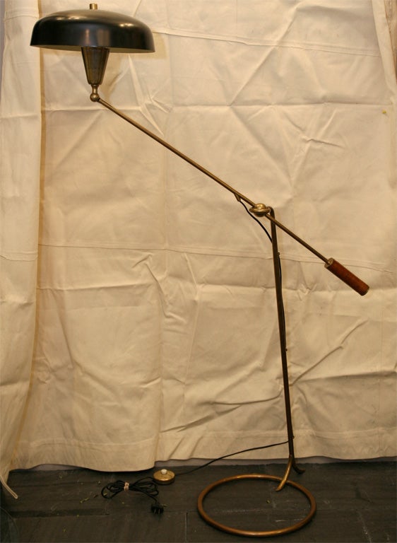 An Articulated Floor Lamp with unique adjustment mechanism by Arredoluce