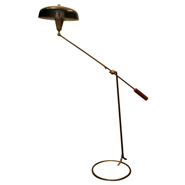 An Articulated Floor Lamp with unique adjustment by  Arredoluce
