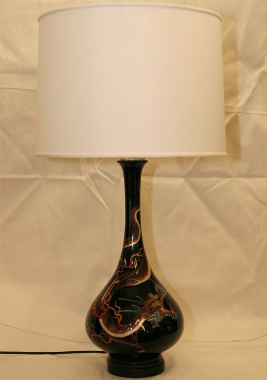 A cloissone lamp with dragon.