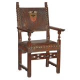 Louis XIII style walnut and leather armchair