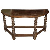 A 17th Century Portuguese Oak Demi-lune Table