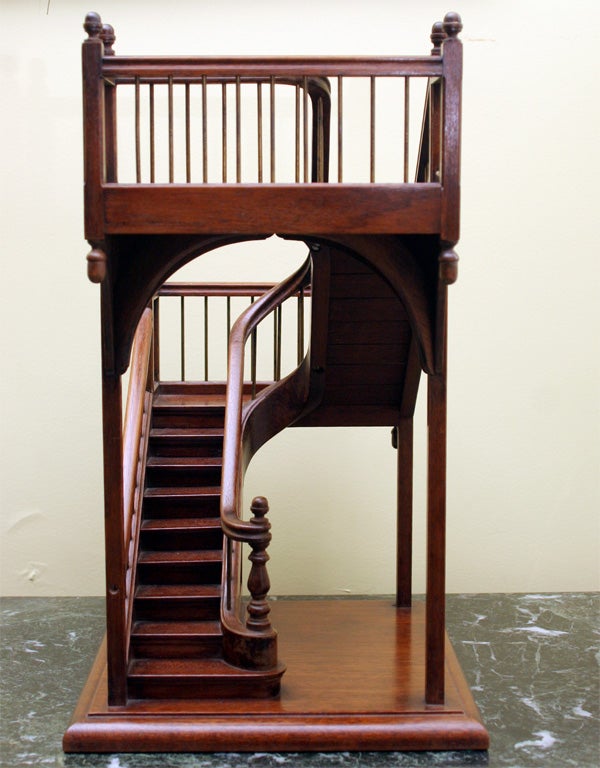 Fine architect's model of a staircase in solid mahogany with brass balusters and turned posts.