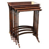 Antique A nest of four Regency rosewood tables of exceptionally fine col