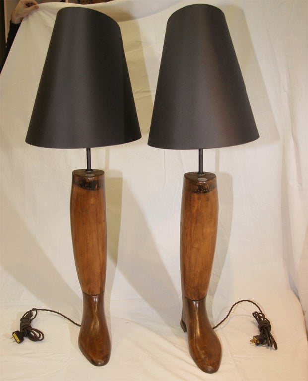 Pair of Boot Lamps fashioned from wooden boot inserts.  Shades included as shown.