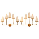 Iron sconces, after Jean Royere