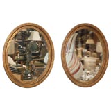 Pr Mirrors in Oval Gilt Frames