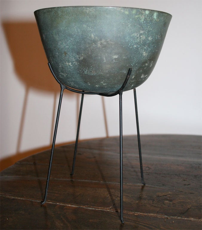 A Collection of Bronze Vessels on Stands.