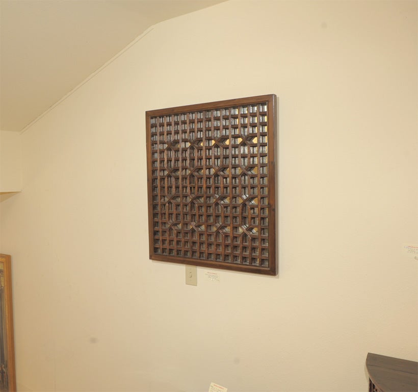 Chinese lattice mirrored panel