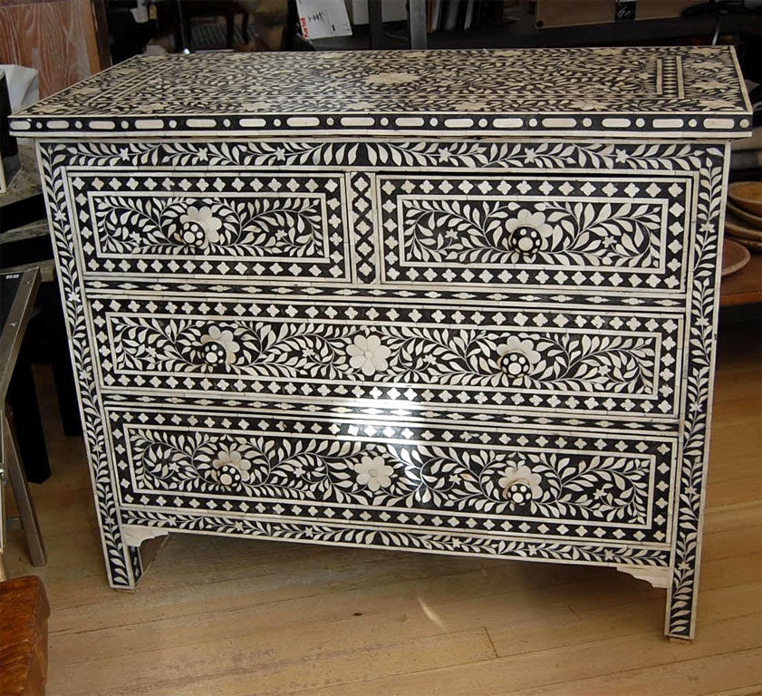 Intricately pieced bone inlay chest with botanical design