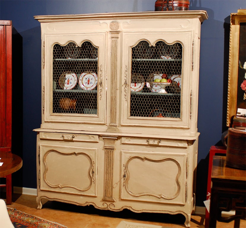 French painted buffet with hutch top, paint appears to be original on the cabinet with the base wood being walnut.  Originally doors were probably glass and have been replaced with wire mesh.  Appears to have been done many years ago.