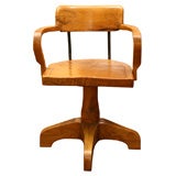 Interesting solid burled wood swivel desk chair