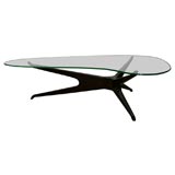A Biomorphic Glass Topped Table Kagan style..