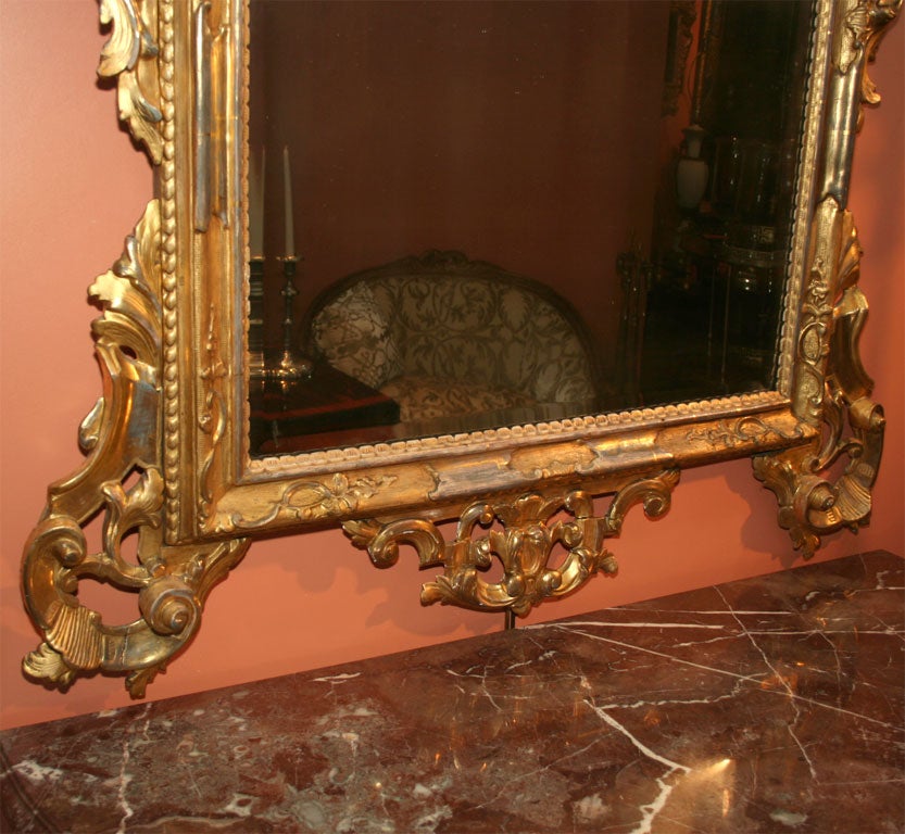 Large Italian Louis XIV giltwood mirror.