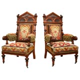 A Pair of Russian Oak and Brown Oak Armchairs