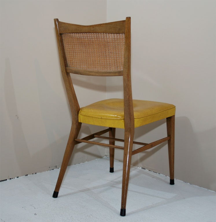 Mid-20th Century Set of Sixteen Cane Back Dining Chairs by Paul McCobb