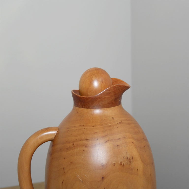 A pair of sculptural hand carved carafes with insulated glass liner by Pietro Manzoni for Vietri. Italian, circa 1970.