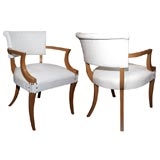 A PAIR OF ARM CHAIRS ATTRIBUTED TO BILLY HAINES