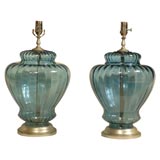 PAIR OF  BLUE GLASS LAMPS WITH CUSTOM  SILVER GILT BASES