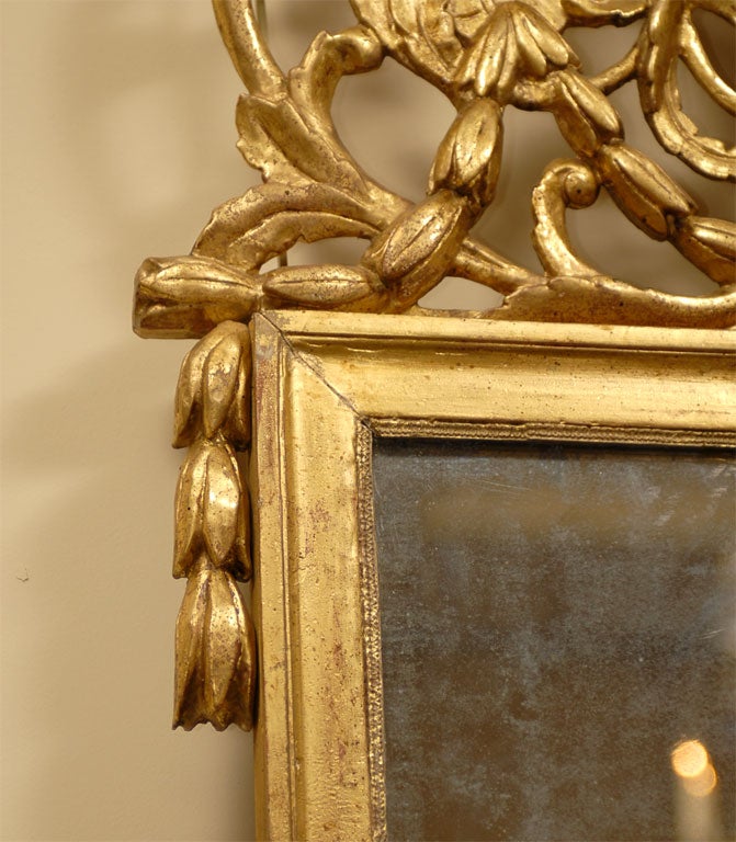 Late 18th Century Louis XVI Period Giltwood Mirror with Crest, France, circa 1780 For Sale