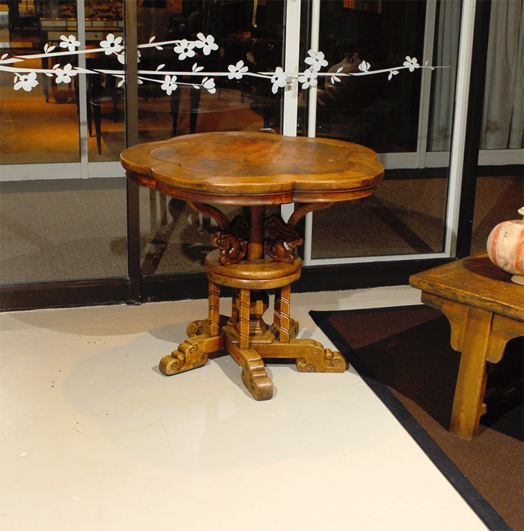 This is an incredibly rare piece of furniture. This five-sided rotating table is a classic table.  Originally this would have served as an altar table.  It would now be perfect in a foyer or as a display table.  A real piece of art.  Check out the