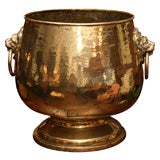 English, Large brass jardinere with lion head handles