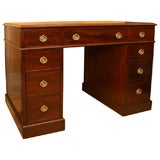 English, mahogany two pedestal desk with tooled leather top