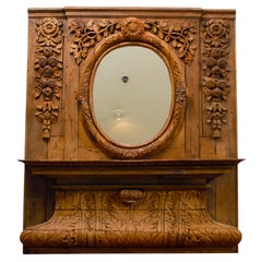 French Carved Wood Trumeau Mirror from Normandy with Oval Mirror and Shelf