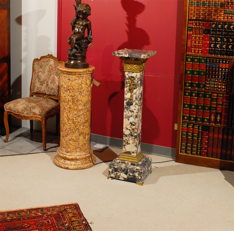 Very nice mottled marble pedestal with ormolu mounts and a revolving top