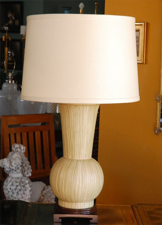 Paul Marra modern, transitional  Urn Table lamps shown in pale green strie finish with walnut base.  Price quoted is per lamp with shade.  