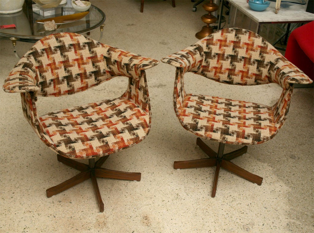 Stylish, bentwood swivel chairs by Plycraft have original grooovy plaid fabric.