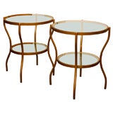 Pair of English gilt round glass top tables
