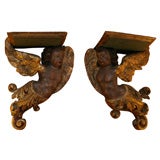 Pair of Continental Carved Putti Brackets, late 17th century