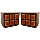 Pair of walnut cabinets with trifold doors