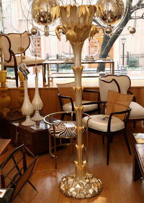 Pair of ornate giltwood tree form torchieres