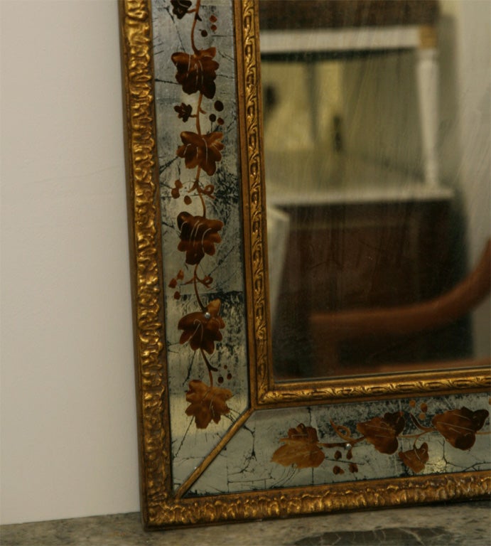 Pair of Eglomise decorated mirrors by Jansen