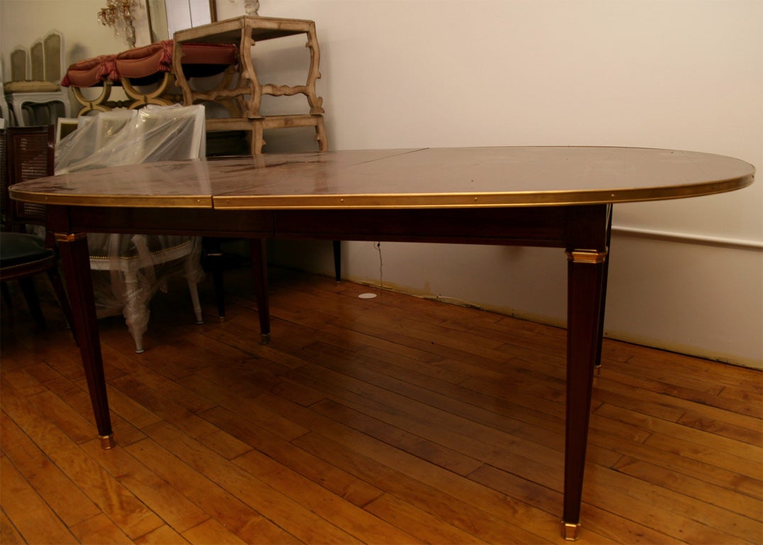 Jansen Dining table with gilded bronze mounts