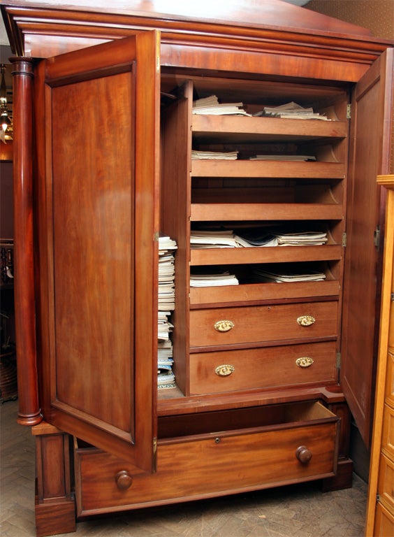 MAHOGANY SIMPLE TWO-DOOR, WITH DRAWER GENTLEMAN'S WARDROBE <br />
BROKEN PEDIMENT TOP WITH COLUMNS LEFT AND RIGHT