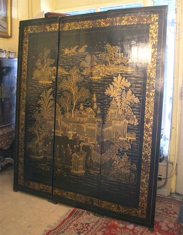 A magnificent and unusual antique 3 panel China trade lacquer screen.  Two sided.