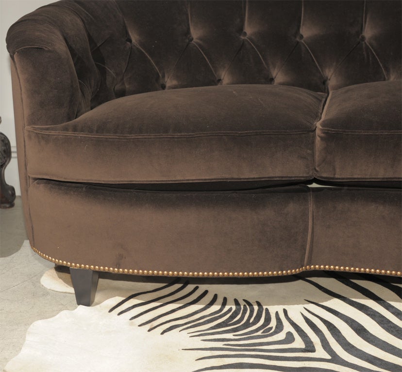 sofa with tufted back