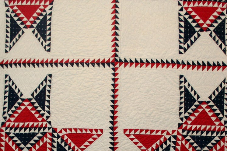 American Antique Quilt:  Feathered Star Variation