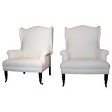pair of upholstered wing chairs