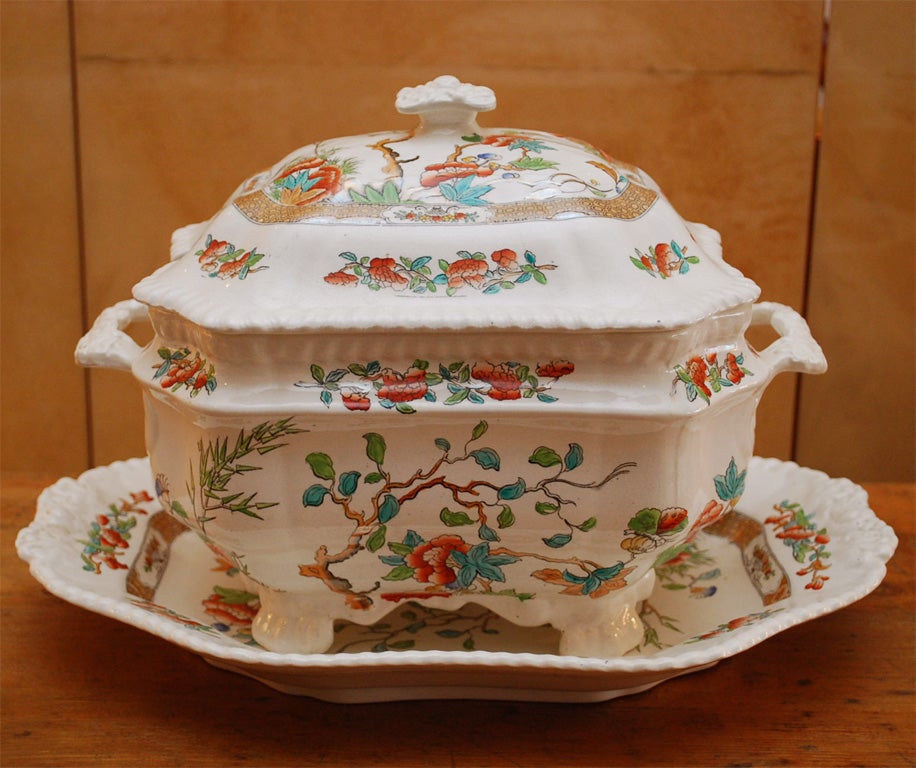 An unusual set of Copelands China in Peonies Pattern #240794 made by Spode especially for the famous London china shop, Thomas Goodes on 19th South Audley Street (stamped on the back).  The 67 pieces include: 4 platters, 21 dinner plates with a