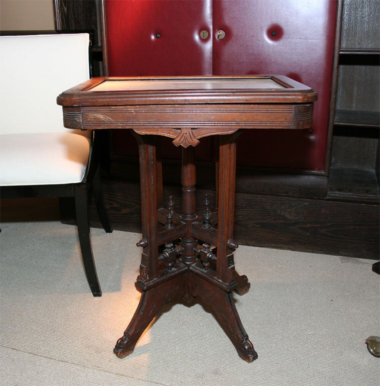 Elegant cherry wood Victorian rectangular side table with white marble top.Seating on four leg.Sculpted base.